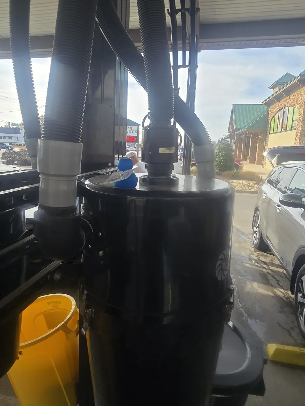 Kosher Duck at Papa Bear Car Wash Hiding on Top of One of the Vacuums